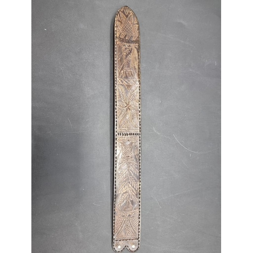 1535 - An antique carved horn stay busk, 30.5cm long.  