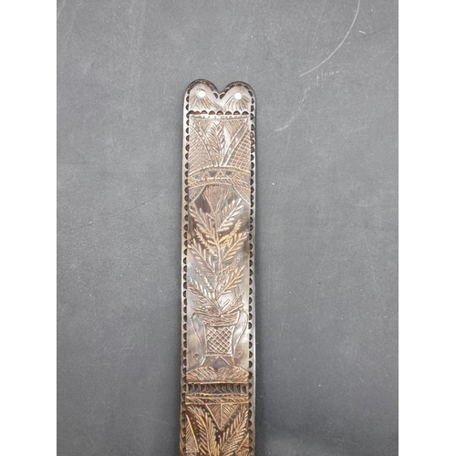 1535 - An antique carved horn stay busk, 30.5cm long.  