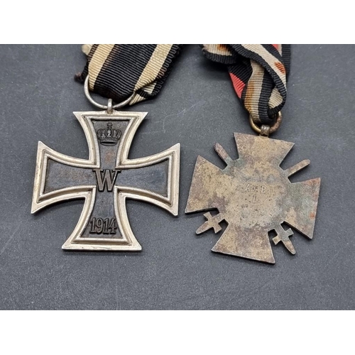 1541 - An Imperial German Iron Cross, 2nd class; together with a Combatants Medal; and four Imperial Medal ... 