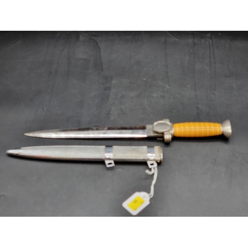 1551 - A German Third Reich Red Cross Leader's dagger and sheath. 