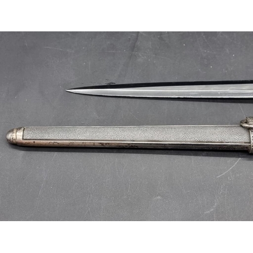 1555 - A German Third Reich army officer's dagger and sheath, with orange grip, maker WKC.