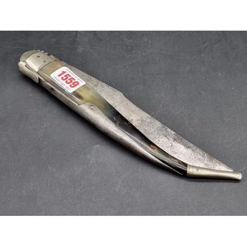 1559 - WITHDRAWN FROM SALE A Spanish navaja folding knife, with ratchet mechanism and horn scales, the blad... 