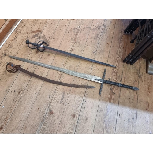 1602 - A reproduction broad sword; together with another reproduction Claymore; and another sabre. (3)... 