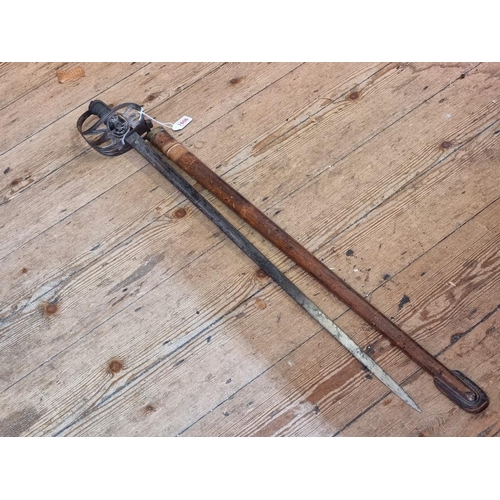 1606 - A Victorian Light Infantry officer's sword and leather scabbard.