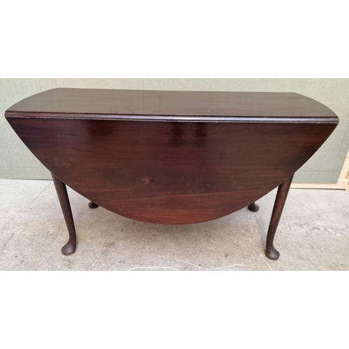 1619 - An 18th century mahogany drop leaf table, 120.5cm long x 134cm when open. (repairs and replacements ... 