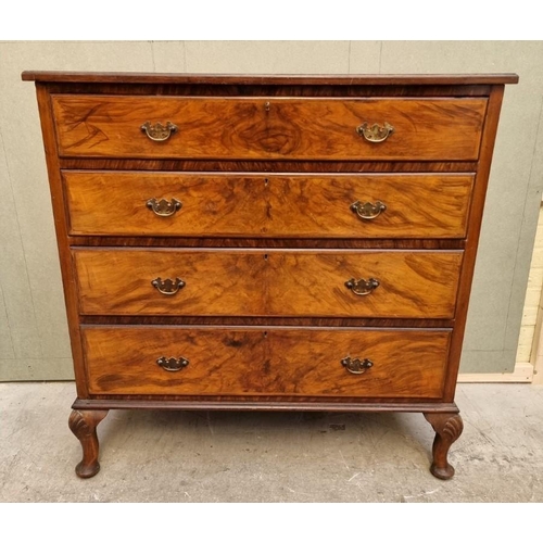 1626 - A 1930s figured walnut chest of drawers, 110cm high x 106.5cm wide.