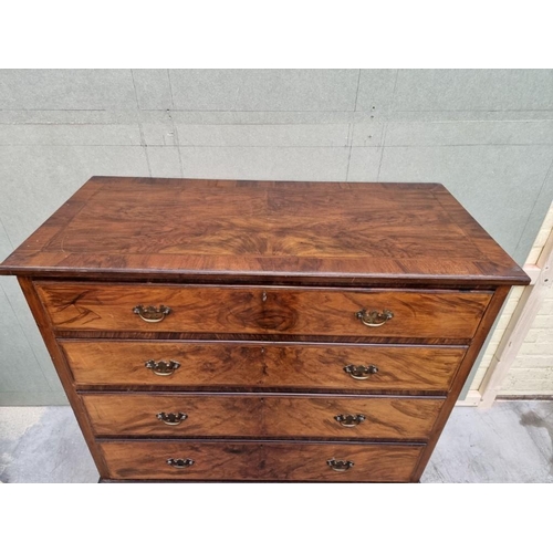 1626 - A 1930s figured walnut chest of drawers, 110cm high x 106.5cm wide.