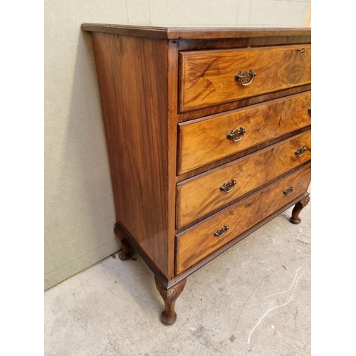 1626 - A 1930s figured walnut chest of drawers, 110cm high x 106.5cm wide.