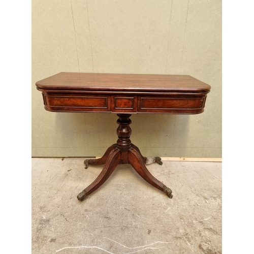 1628 - A George IV mahogany card table, 88cm wide. (break to leg).