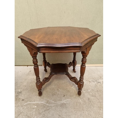 1631 - An Edwardian walnut octagonal occasional table, 79cm diameter.