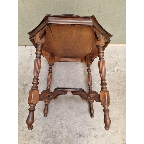 1631 - An Edwardian walnut octagonal occasional table, 79cm diameter.