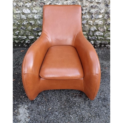 1651 - A modern leatherette chair and stool, (surface wear).