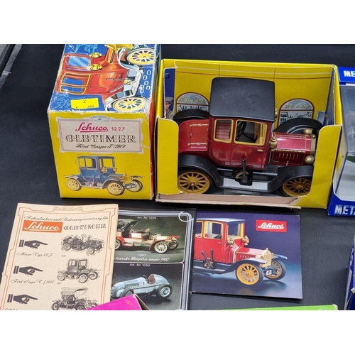 101 - Rio: a collection of vintage diecast vehicles; together with a Schuco 'Old Timers', and ot... 