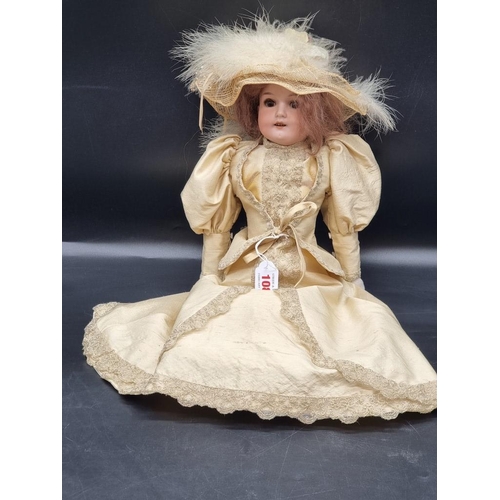 108 - Armand Marseille: an antique bisque head doll, impressed mark 370 AM 1 DEP, with brown weighted eyes... 