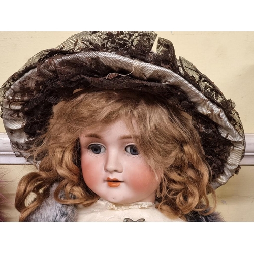 110 - Schoenau & Hoffmeister: a large antique bisque head doll, impressed marks S PB H, 1906, No 15, w... 