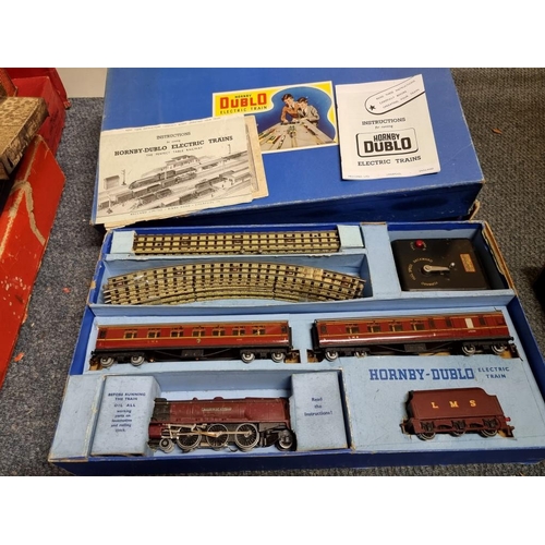 114 - Hornby Dublo: two vintage boxed train sets, comprising: Passenger Train 'Duchess of Montrose' B... 