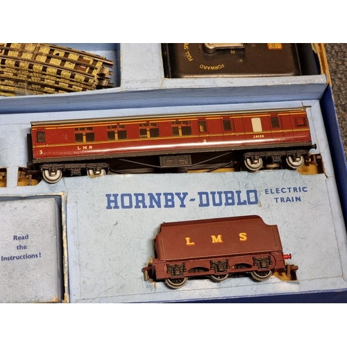 114 - Hornby Dublo: two vintage boxed train sets, comprising: Passenger Train 'Duchess of Montrose' B... 