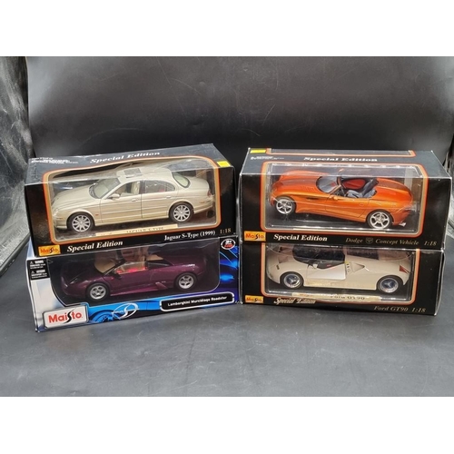 118 - Maisto: four 1/18 scale vehicles to include Jaguar S-Type, boxed.