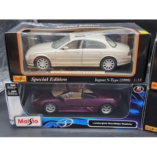 118 - Maisto: four 1/18 scale vehicles to include Jaguar S-Type, boxed.