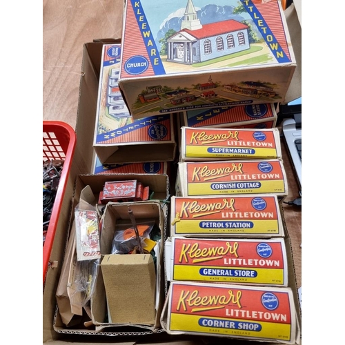 124 - Kleeware: a group of 11 'Littletown' buildings, circa 1950s, in original boxes; together with a coll... 