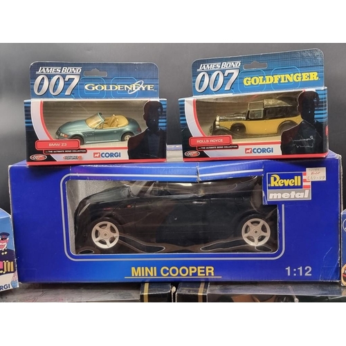 125 - Revell: 1:12 scale Mini Cooper; together with four boxed Burago models and six Corgi vehicles, ... 