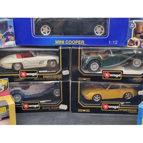 125 - Revell: 1:12 scale Mini Cooper; together with four boxed Burago models and six Corgi vehicles, ... 