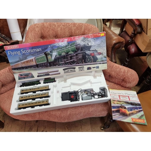 127 - Piko: a boxed train set H0 57110; together with an incomplete Hornby OO Flying Scotsman R1072.... 