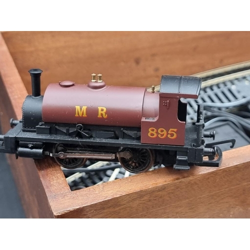 128 - Hornby OO Gauge: a trainset, in wooden box, to include an additional 'Thomas' locomotive.... 