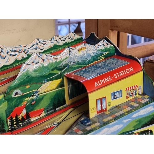 13 - Technofix: a tinplate Alpine-Express, with two coaches and original Technofix key, in original box.... 