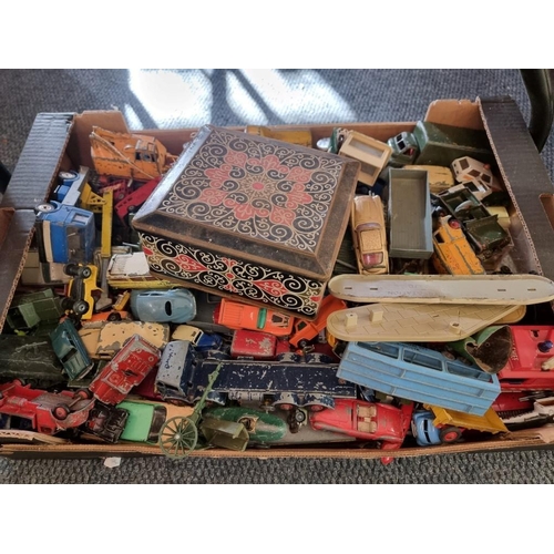 141 - Diecast: a large collection in tray of playworn vehicles, various ages and condition. ... 