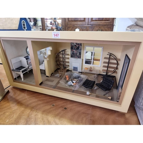 147 - Doll's House: a single storey, one room, hacienda style doll house with a small quantity of furnitur... 