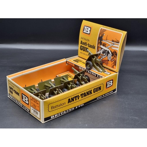 29 - Britains: a vintage shop display box containing twelve Battalion Anti-tank Gun No.9720.... 