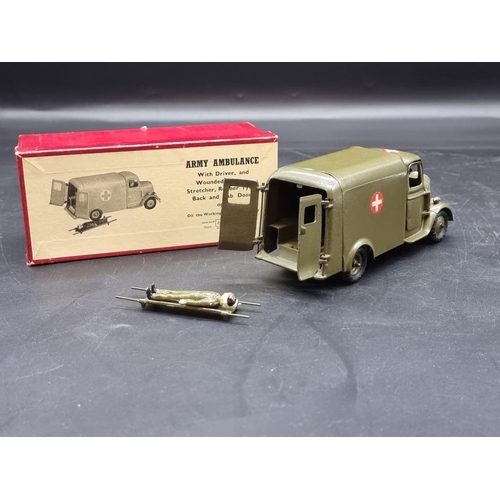 35 - Britains: a vintage Army Ambulance No.1512, with driver and casualty on stretcher.