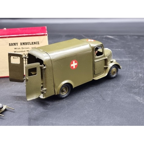 35 - Britains: a vintage Army Ambulance No.1512, with driver and casualty on stretcher.