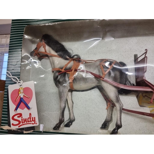 39 - Sindy: a 1970's gig and horse, by Pedigree.