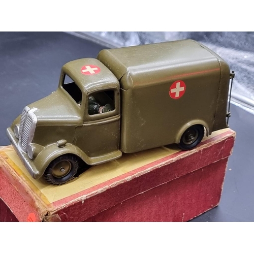 40 - Britains: three military vehicles, comprising: Army Truck No.1334; Covered Tender No.1433; and Ambul... 