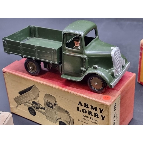 41 - Britains: three vintage military vehicles, comprising: Army Lorry No.1334 (x2); a Beetle Lorry No.18... 