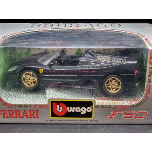 44 - Burago: a black Ferrari F50 Limited Edition; together with another F50, both boxed.