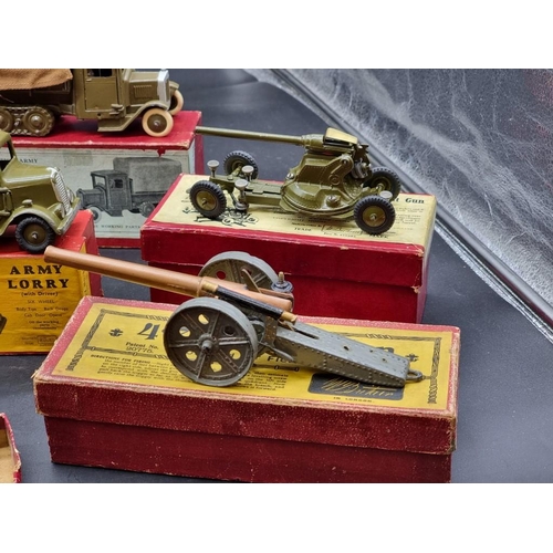 47 - Britains: a collection of vintage military vehicles and guns, comprising: Nos.1335 (x2); 1334; 1717;... 