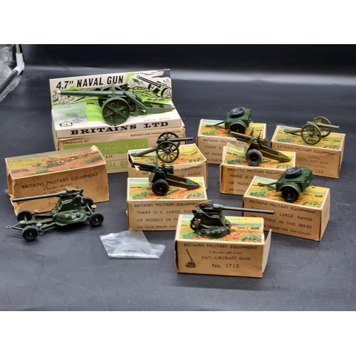 48 - Britains: 9 military vehicles and guns, circa 1960s, all in original boxes.