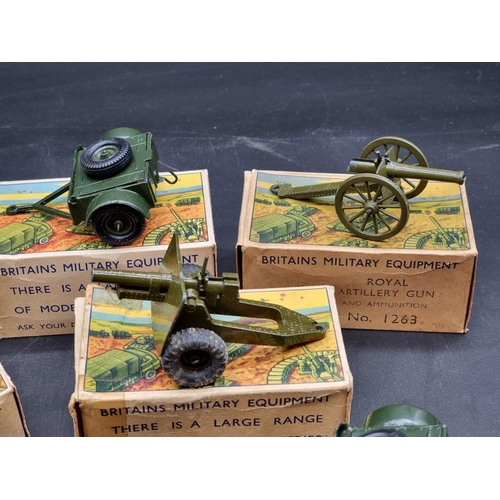 48 - Britains: 9 military vehicles and guns, circa 1960s, all in original boxes.