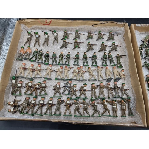 50 - Vintage Lead: a large collection in two trays of Britains, Crescent and similar military figures.... 