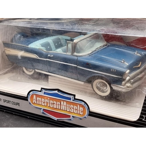 56 - Ertl: American Muscle, 1957 Chevy Bel Air Sport Coupe; together with Anson Classic Red BMW, both box... 