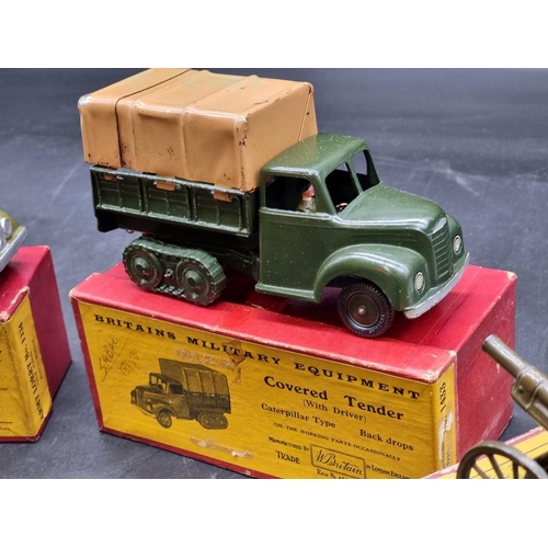 57 - Britains: four vintage boxed military vehicles and guns, comprising Nos.1264; 1433; 1334; 1201; toge... 