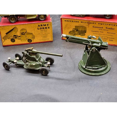 57 - Britains: four vintage boxed military vehicles and guns, comprising Nos.1264; 1433; 1334; 1201; toge... 