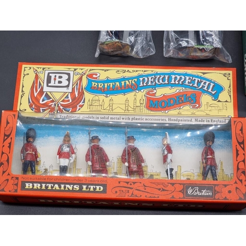 63 - Britains: a collection of Britains figure sets (1970s) in original packaging; together with Roy... 