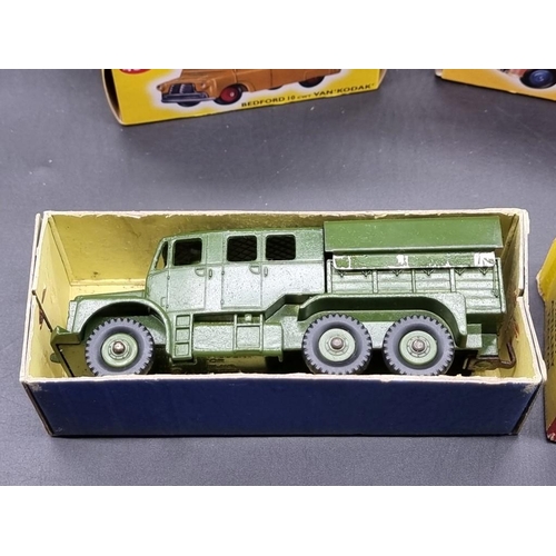 64 - Diecast: a vintage Dinky Supertoys Artillery Tractor No.689, in original box; together with six vehi... 