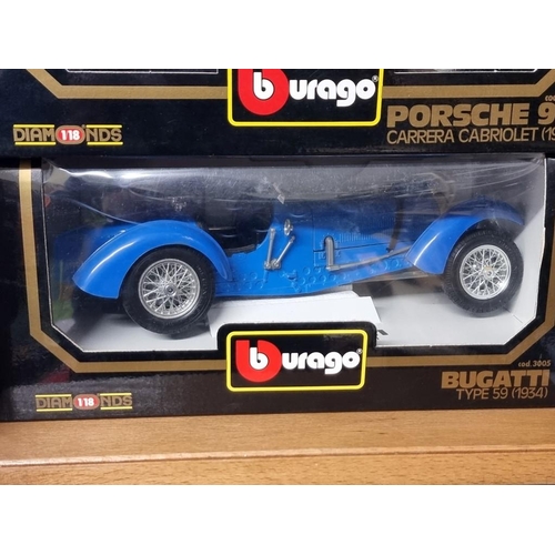 69 - Burago: four boxed Burago cars. to include a green Porsche 911.