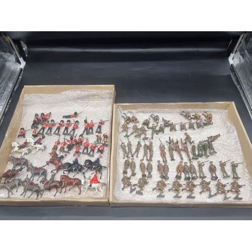 72 - Britains: a collection in 2 trays, vintage soldiers, some mounted, various regiments, to includ... 