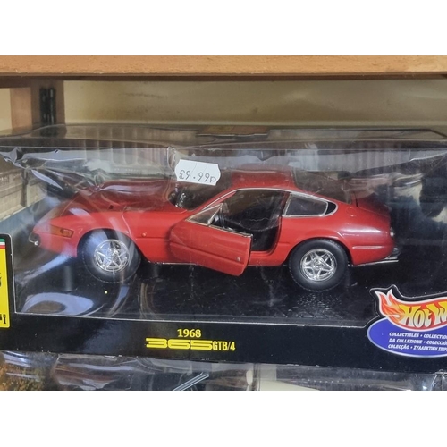 75 - Burago: four boxed Hot Wheels Ferrari models, comprising: 360 Spider; 365GTB; 365GTS and F355 S... 